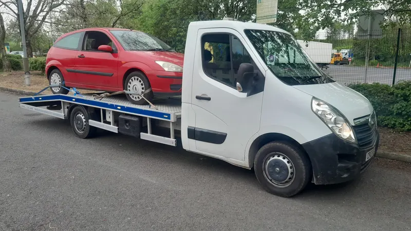 MOT failure car on a recovery truck in Preston